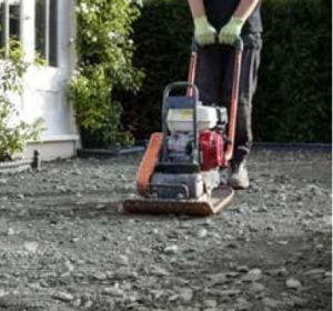 Plate Compactor in use for Paving Installation