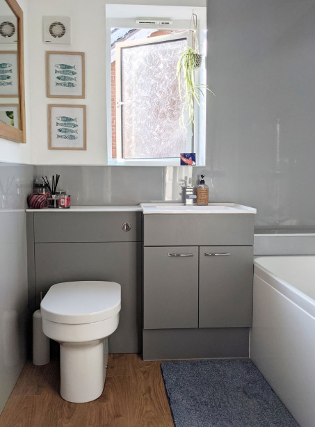 Grey Bathroom with WC basin and large bathtub