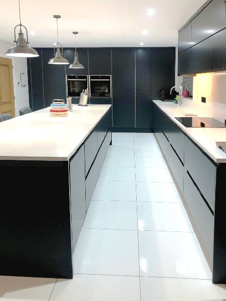 modern kitchen with floor to ceiling cabinets