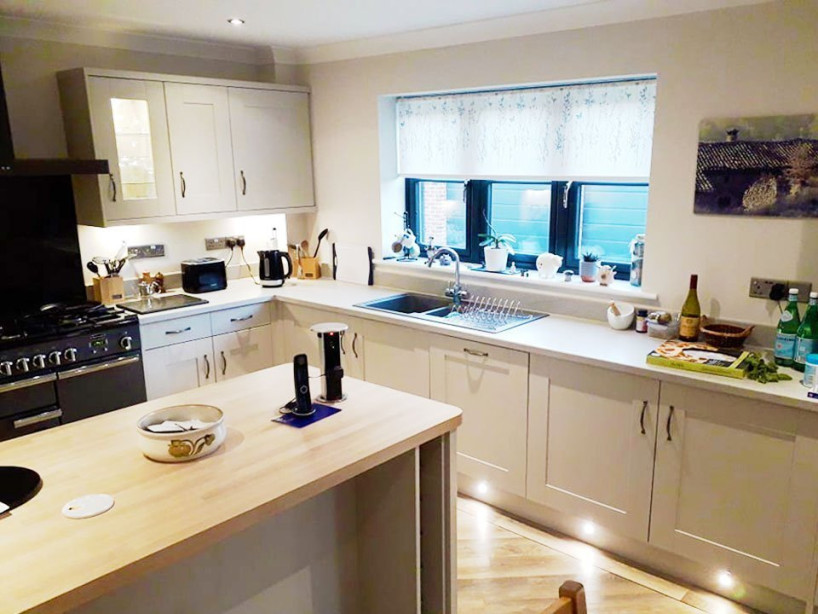 Modern lighting in painter shaker kitchen