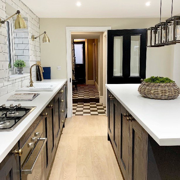 White laminate worktops with shaker style cabinets