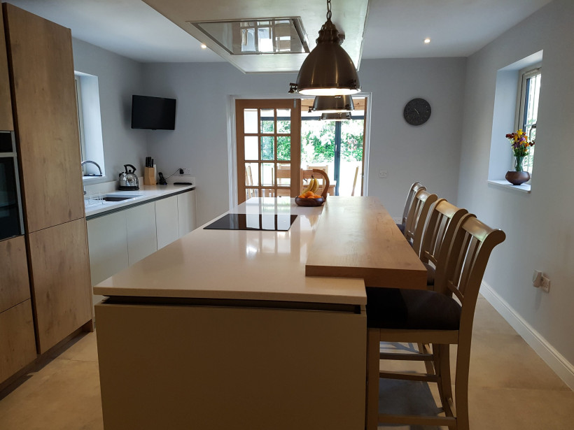 Breakfast bar island and white countertops