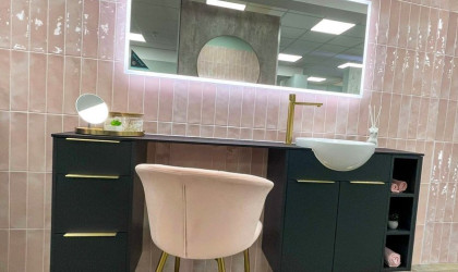 A pink powder room designed by Turnbull.