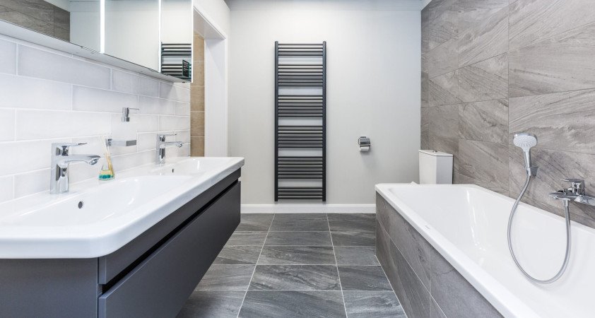 Monochrome bathroom with natural stone